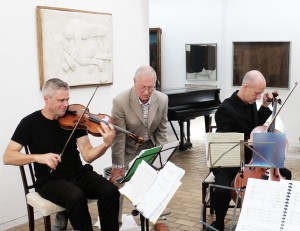 The composer, hard at work with his team. With Neil Heyde and Morgan Goff. Kettles Yard My 2014 (Photo Malene Skaerved)